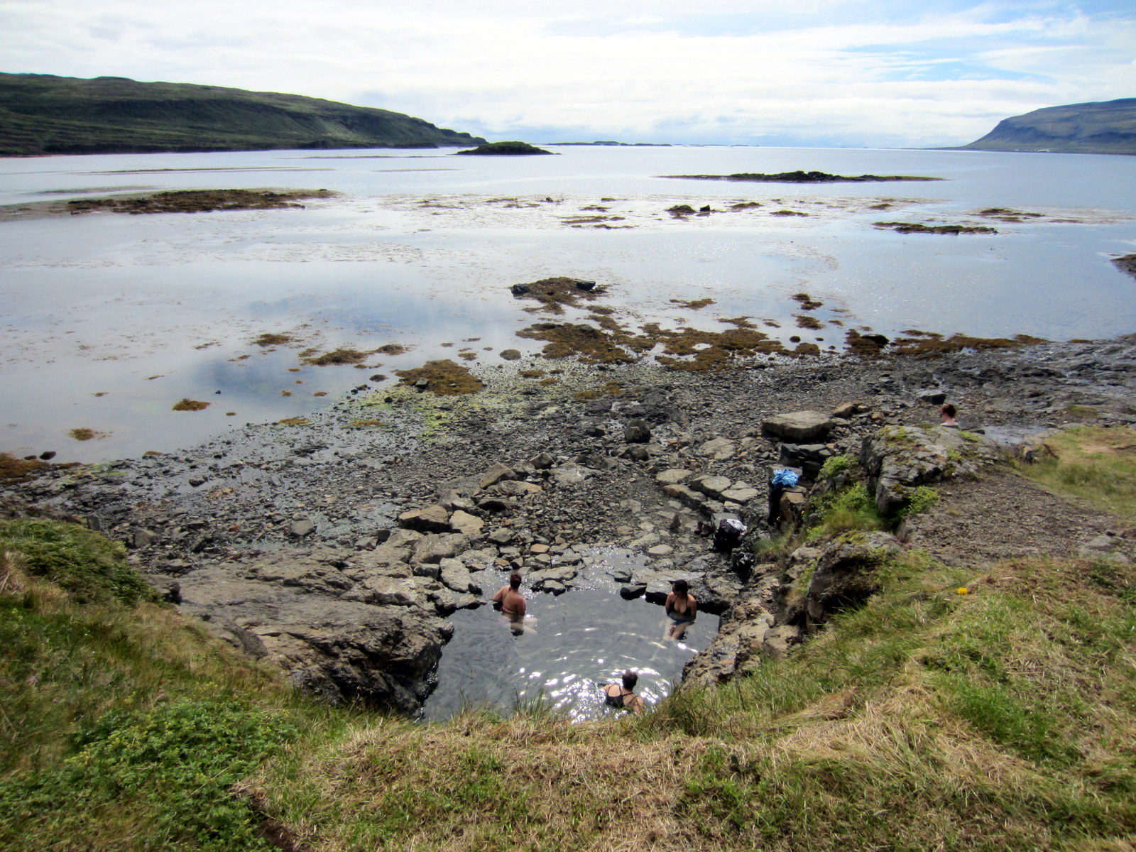 hot pools in the westfjords of iceland - a selection of the